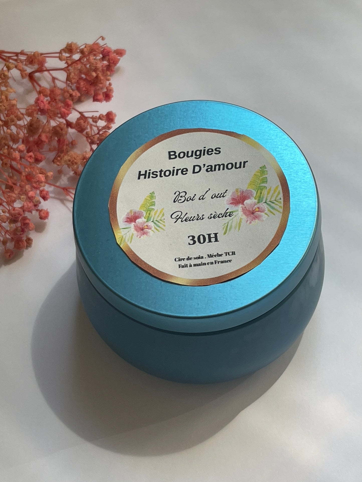 Bougie artisanale en pot turquoise avec fleurs séchées – cire de soja